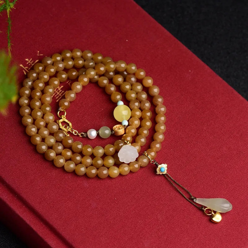 Women's green pine colour jade bracelet with beeswax finish and leaf sequins