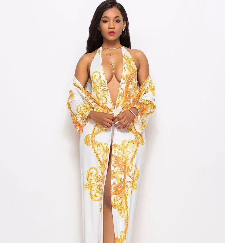 Printed cloak bikini in polyester, available in black or white, sizes M to 2XL