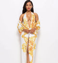 Printed cloak bikini in polyester, available in black or white, sizes M to 2XL