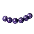 Natural transparent charoite crystal bracelet with platinum beads in 6mm, 8mm, 10mm, and 12mm sizes on wrist