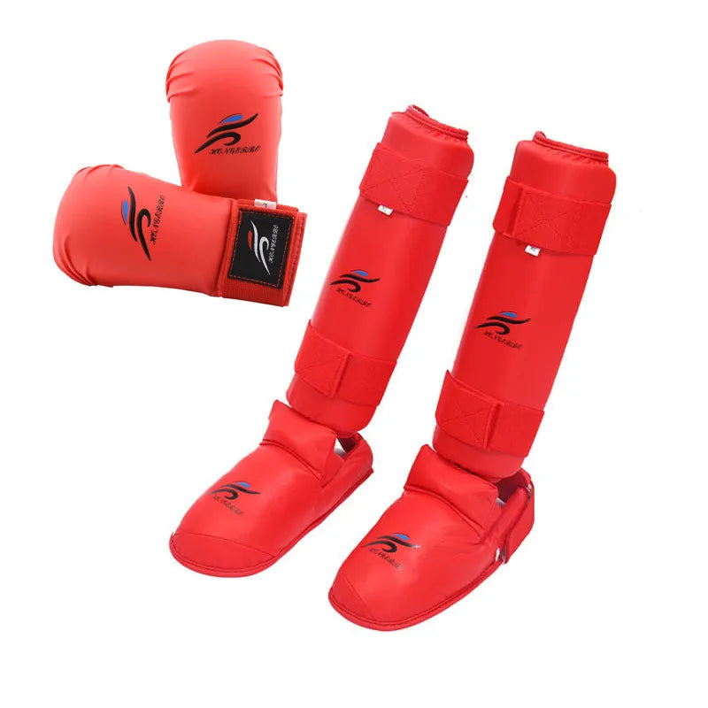 Red and blue martial arts protective gear set showing leg guards, boxing gloves, and a helmet for taekwondo and karate.