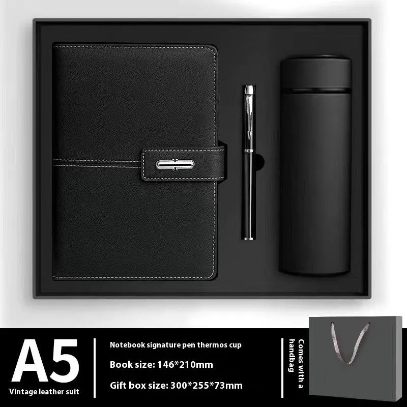 A5 notebook with imitation leather cover in various colours, open to show wood-free paper pages