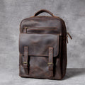 Dark coffee coloured handmade leather backpack with internal computer and mobile phone pockets.