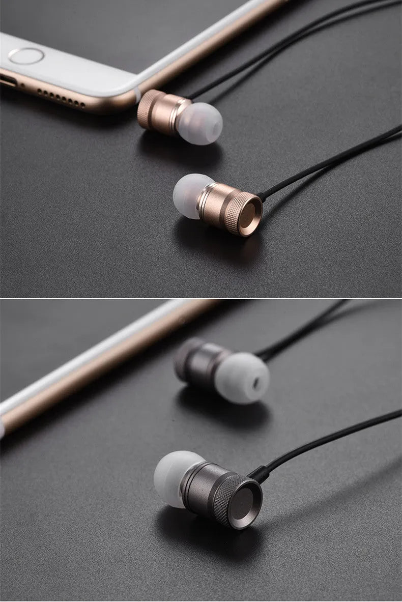Black, gold, pink, and silver coloured in-ear headphones with a 3.5mm plug.