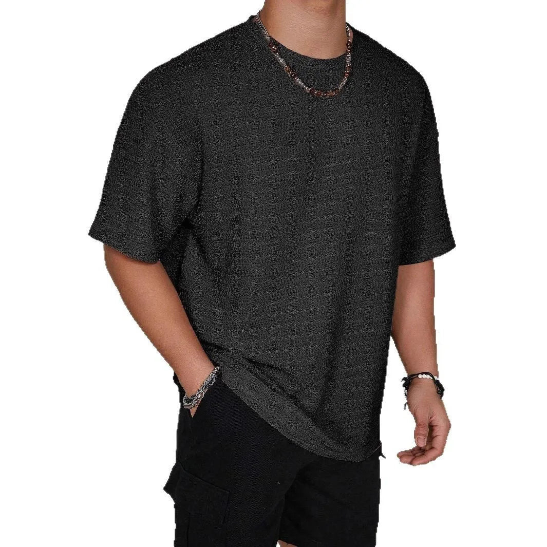 Men's slim-fit T-shirt in solid colour with loose hollow design, made from polyester fabric
