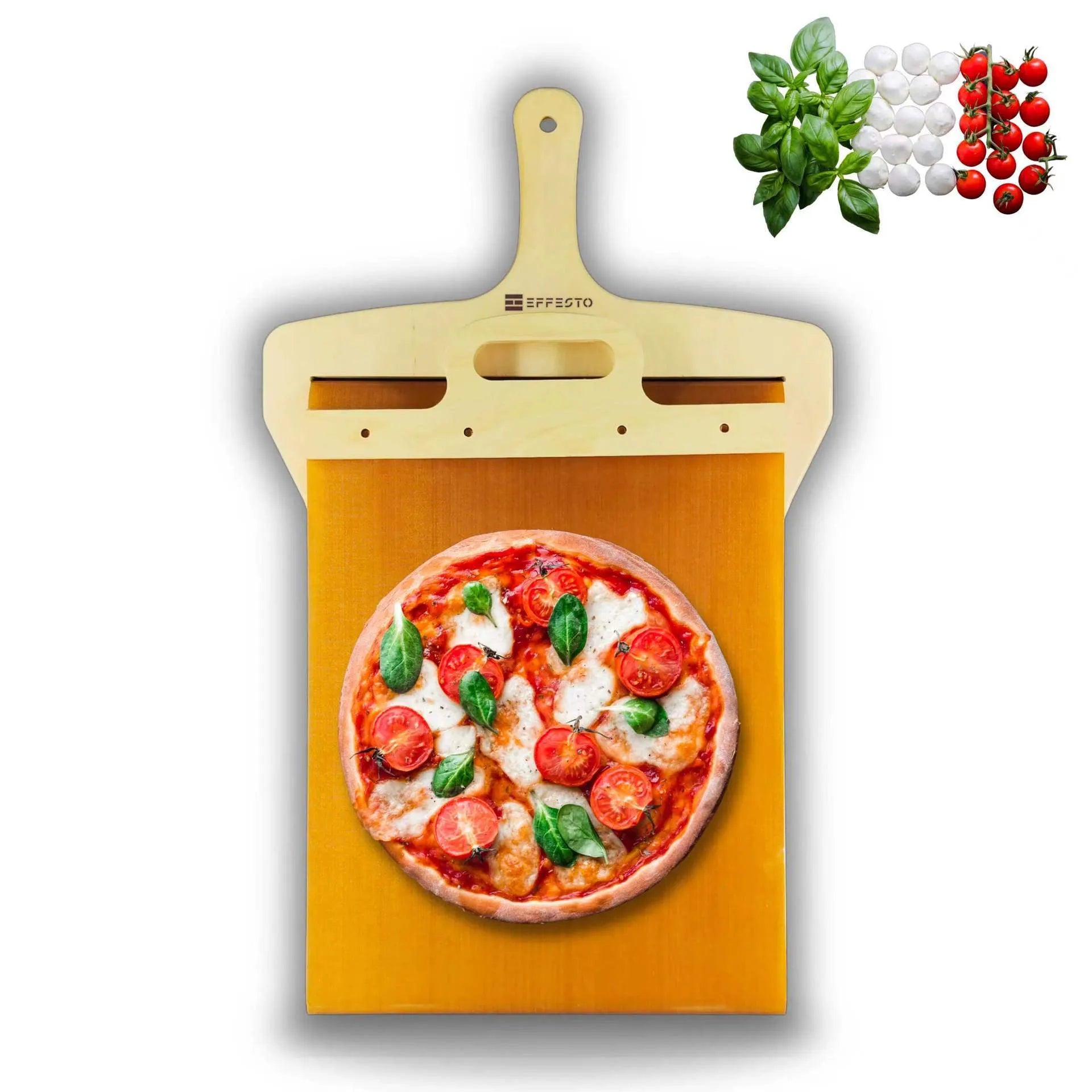 White plastic pizza transfer shovel with handle and hanging hole on a kitchen counter.