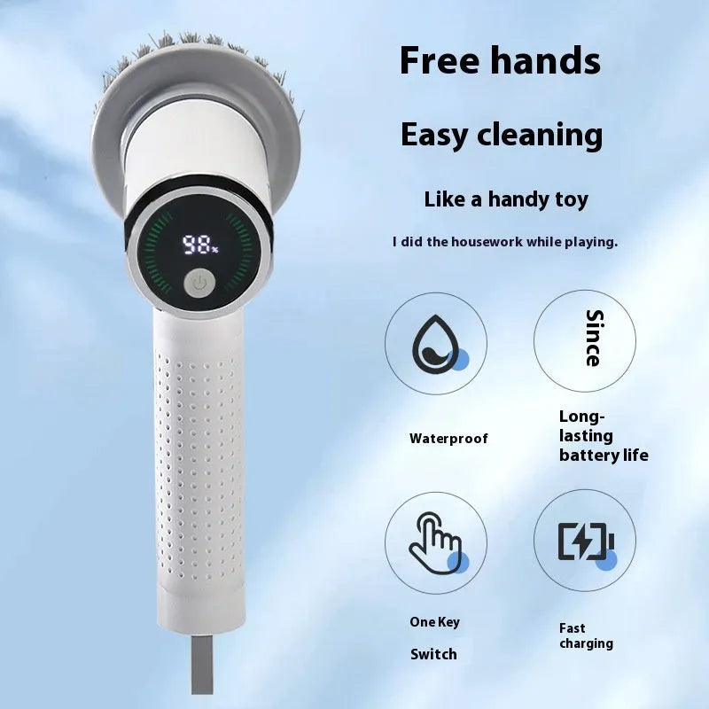 White wireless electric cleaning brush with display, Type-C port, and interchangeable brush heads on a kitchen sink