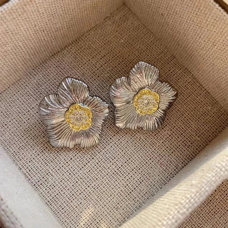 Retro gardenia stud earrings with textured floral design and two-tone electroplated finish