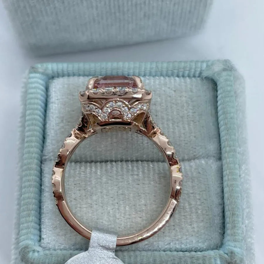 Rose gold electroplated alloy ring with geometric shape design showing angular lines and metallic finish