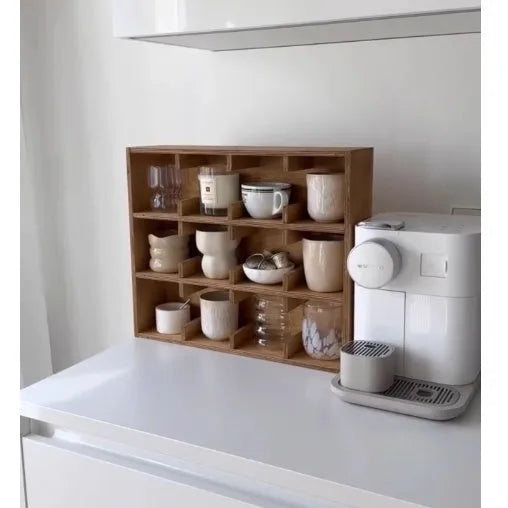Solid birch wood cup storage rack with multiple grid compartments in meridian colour finish
