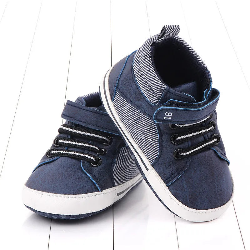 Blue cotton high-top toddler shoes with Velcro closure and non-slip sole