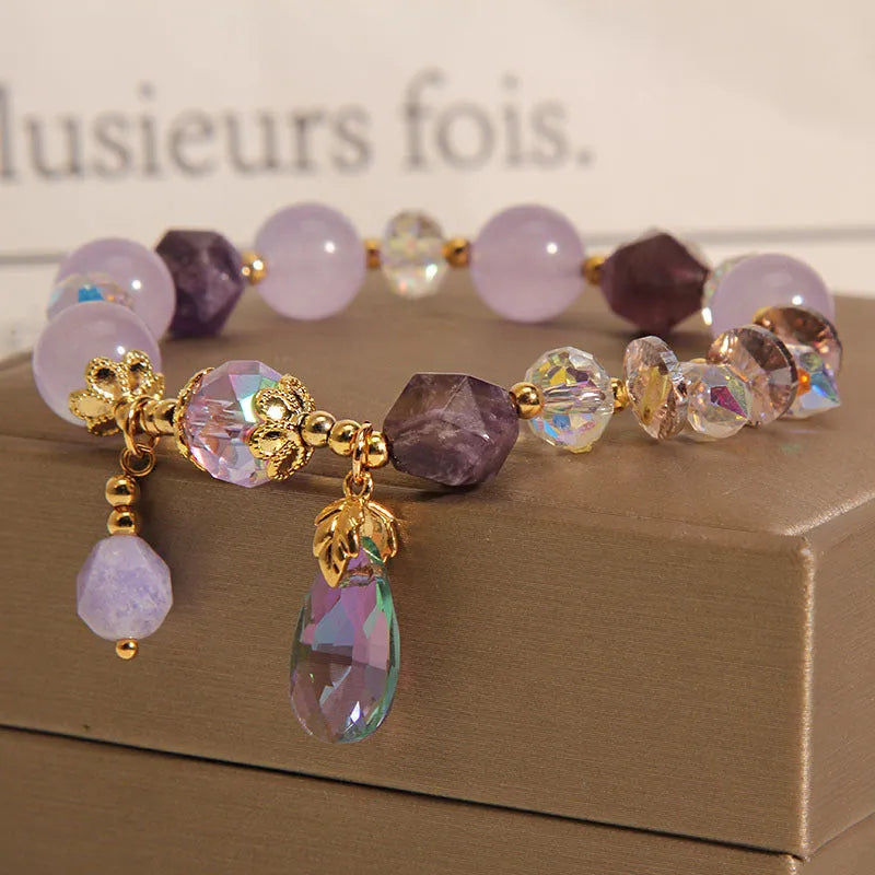 Lavender purple crystal water drop bracelet for children in a retro design.