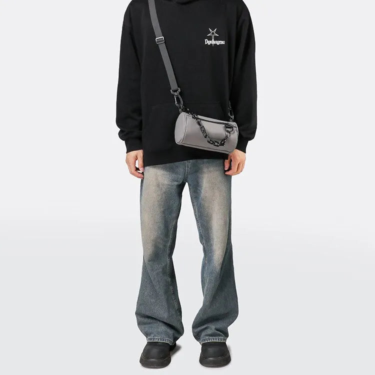 Casual messenger bag in Oxford cloth with chain detail and single-shoulder strap
