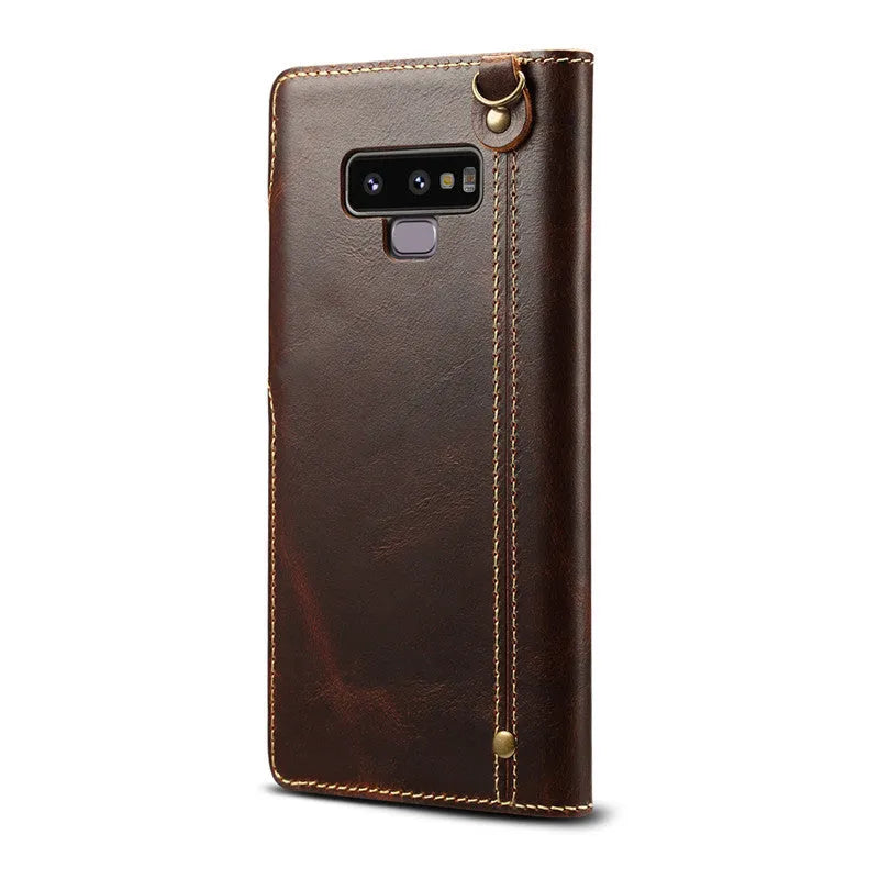 Handmade leather mobile phone case with wallet compartment open showing card slots