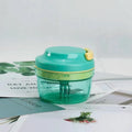 Green kitchen food grinder with 300ml capacity, 10.8cm diameter, stainless steel blade