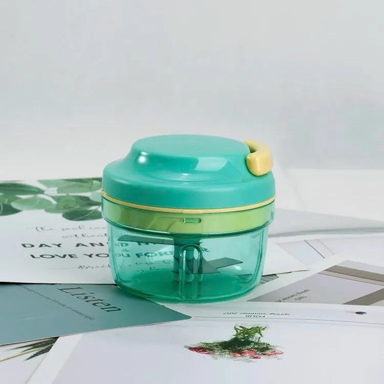 Green kitchen food grinder with 300ml capacity, 10.8cm diameter, stainless steel blade