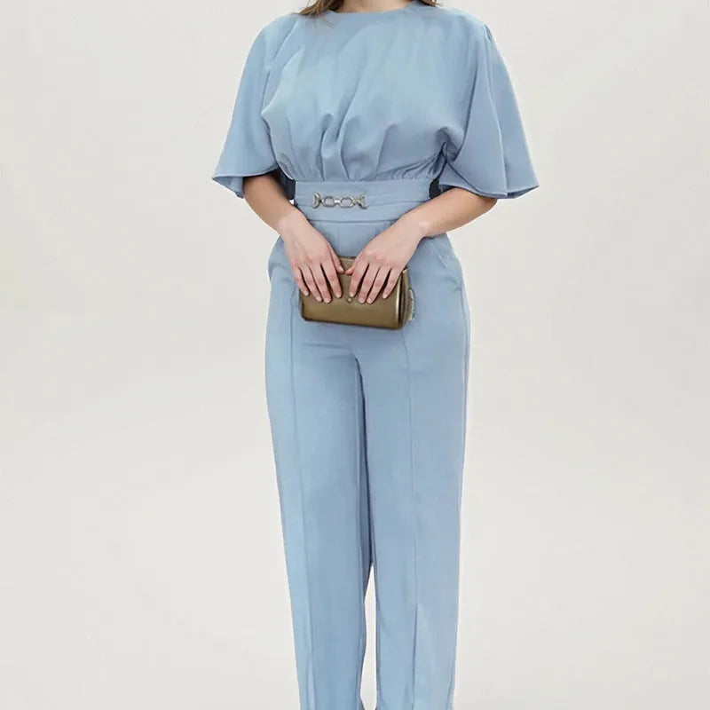 Blue casual suit with long sleeves and trousers, made from polyester fabric, available in sizes S to 3XL.