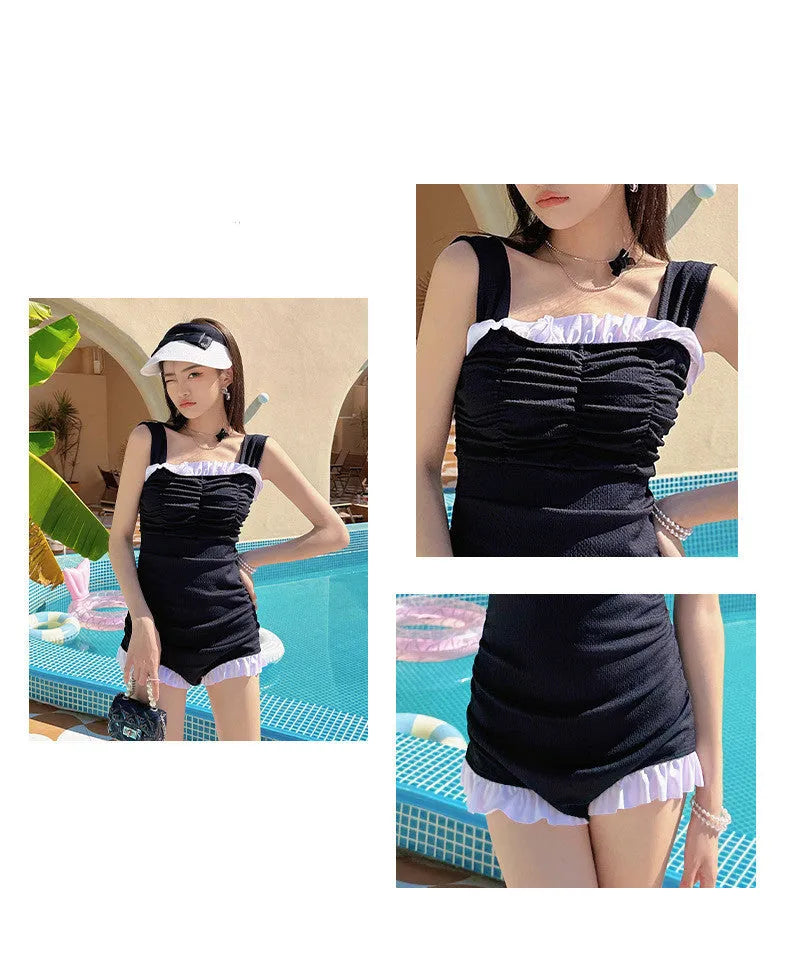 Women's solid colour one-piece swimsuit with suspender straps in jumpsuit design