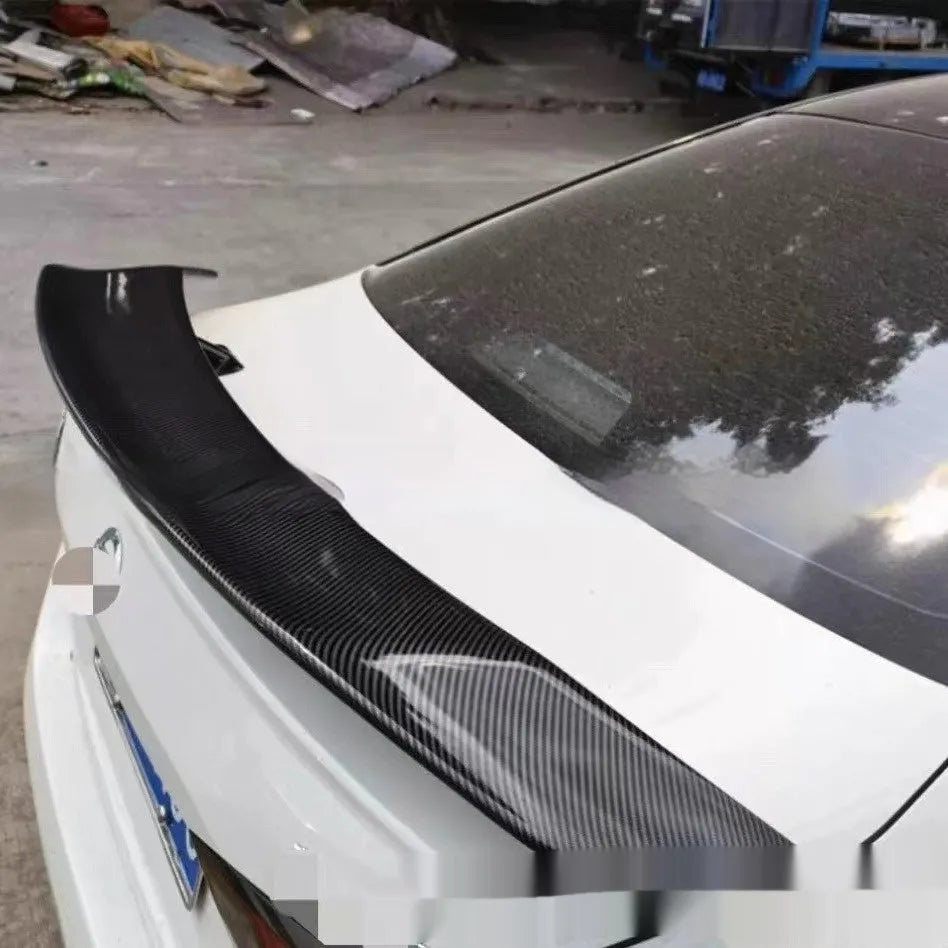 15cm wide punch-free ABS car spoiler in bright black finish on vehicle trunk