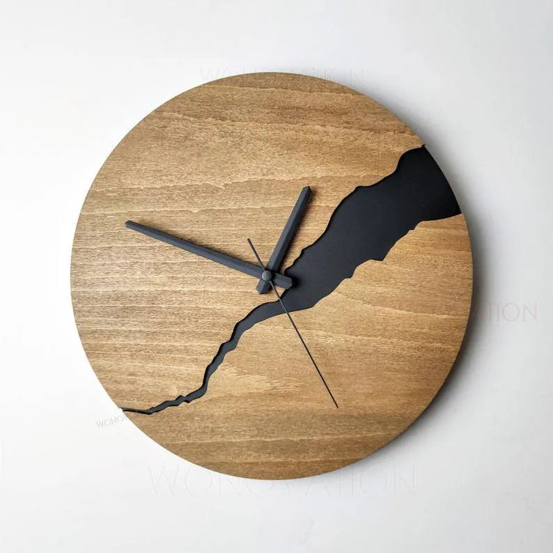 Modern wooden wall clock with cracked finish showing black hands and Arabic numerals on 30cm diameter face