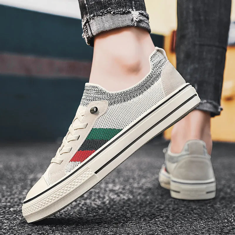 Men's beige casual sneakers with elastic band, mesh lining, and rubber sole shown from side view