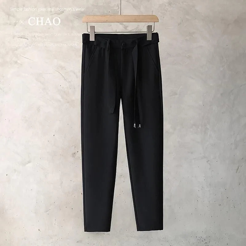 Boys tapered trousers in wool blend fabric with straight leg opening, available in multiple colours and sizes 27-34