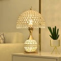 Crystal desk lamp with iron art base in gold finish measuring 29x29x30cm