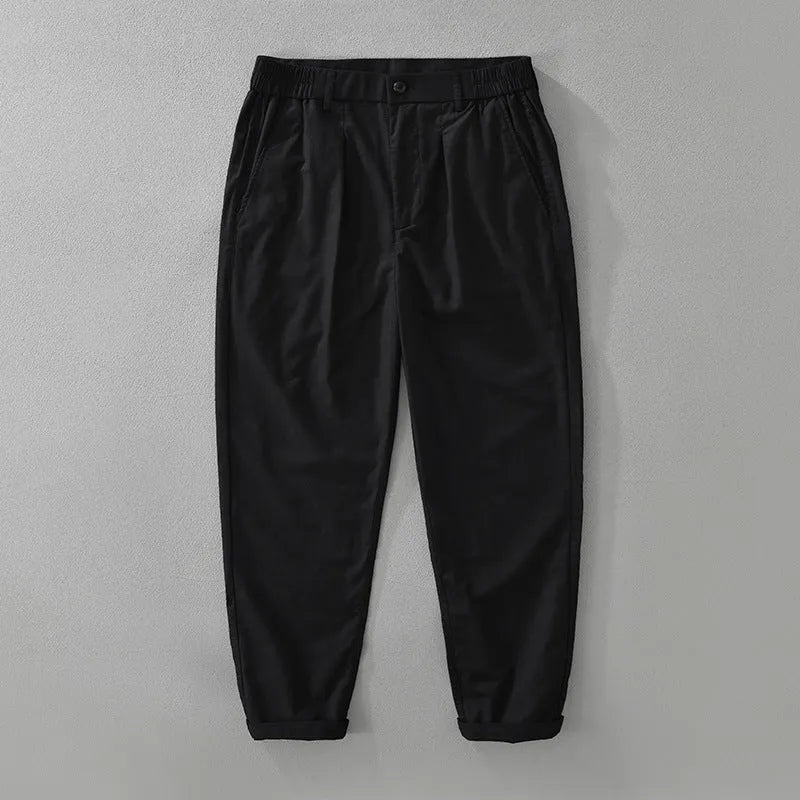 Men's loose straight-leg trousers in a cotton linen blend, shown in a solid colour.