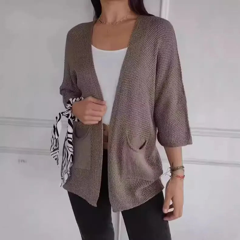 Women's waffle texture cardigan coat in army green with pocket detailing and regular sleeves