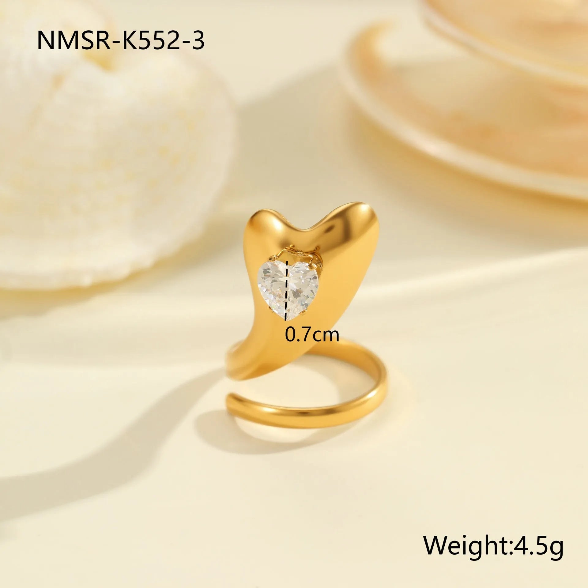 Adjustable stainless steel ring with geometric zircon shapes on a silver-toned band.