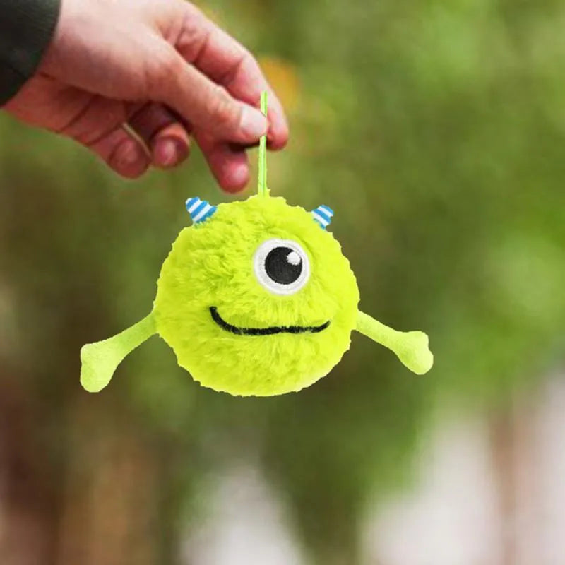 Green interactive dog ball toy with squeaker for teething and play, measuring 12 cm in diameter