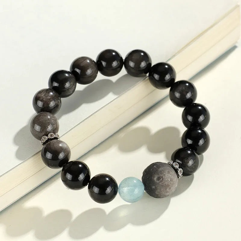 Silver stone bracelet with fox charm and pink, navy blue, black, snowflake ghost crystals.