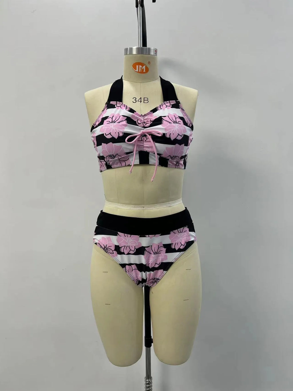 Black women's split bikini with belly-covered slimming design for swimming.
