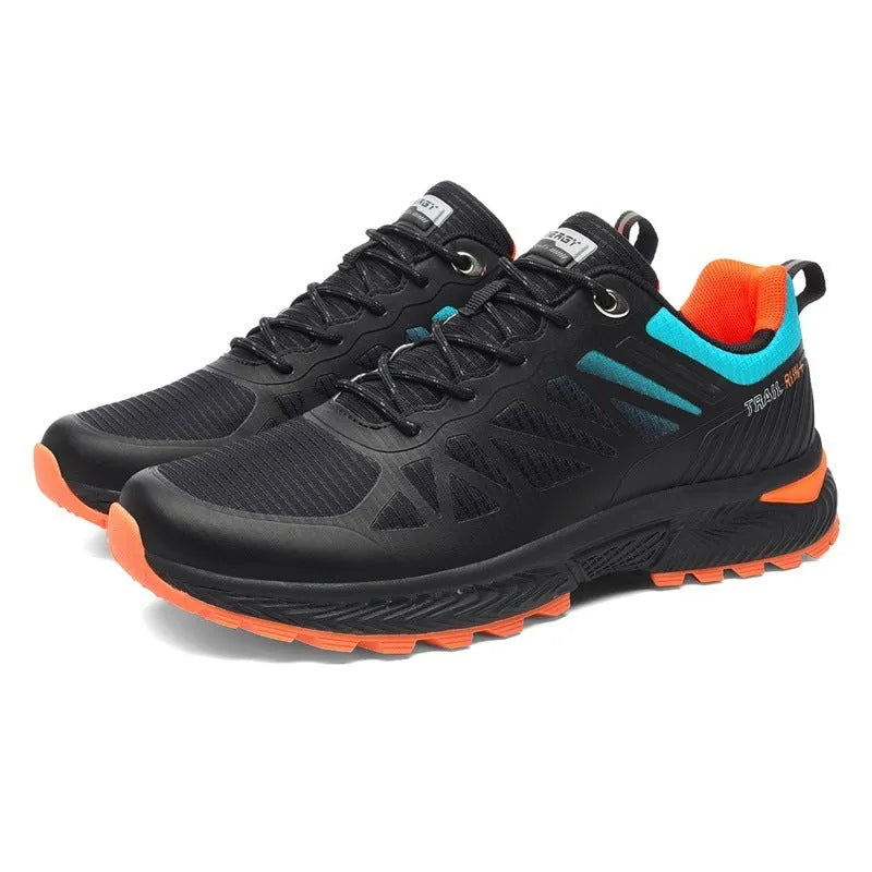 Men's black breathable mesh running shoes with round toe and front lace-up closure on outdoor surface