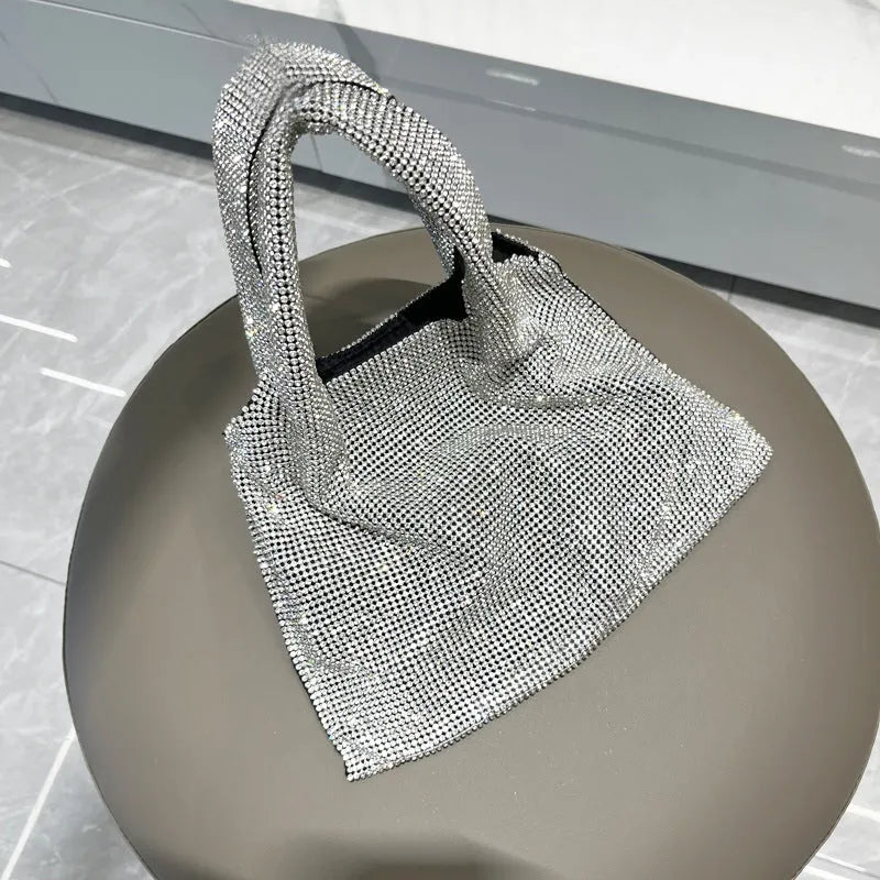 Silver cotton thread party handbag with shiny rhinestones and open outer pocket