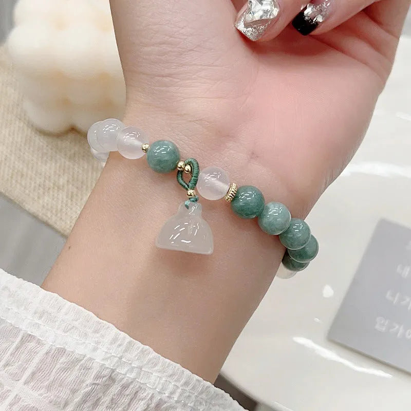 Women's retro Chinese style agate bracelet with lotus seedpod design and handmade craftsmanship