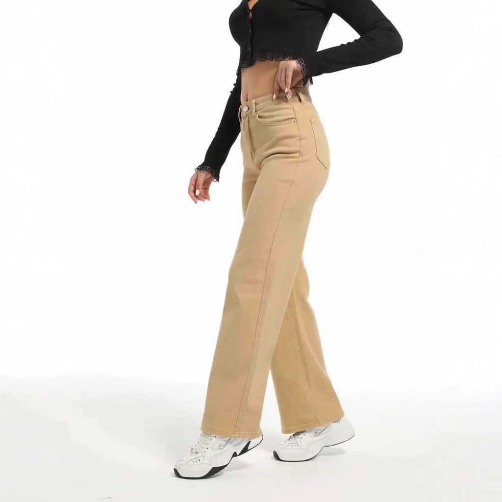 Women's high-waist straight jeans with wide leg design in apricot colour, showing 100% cotton fabric with high elasticity