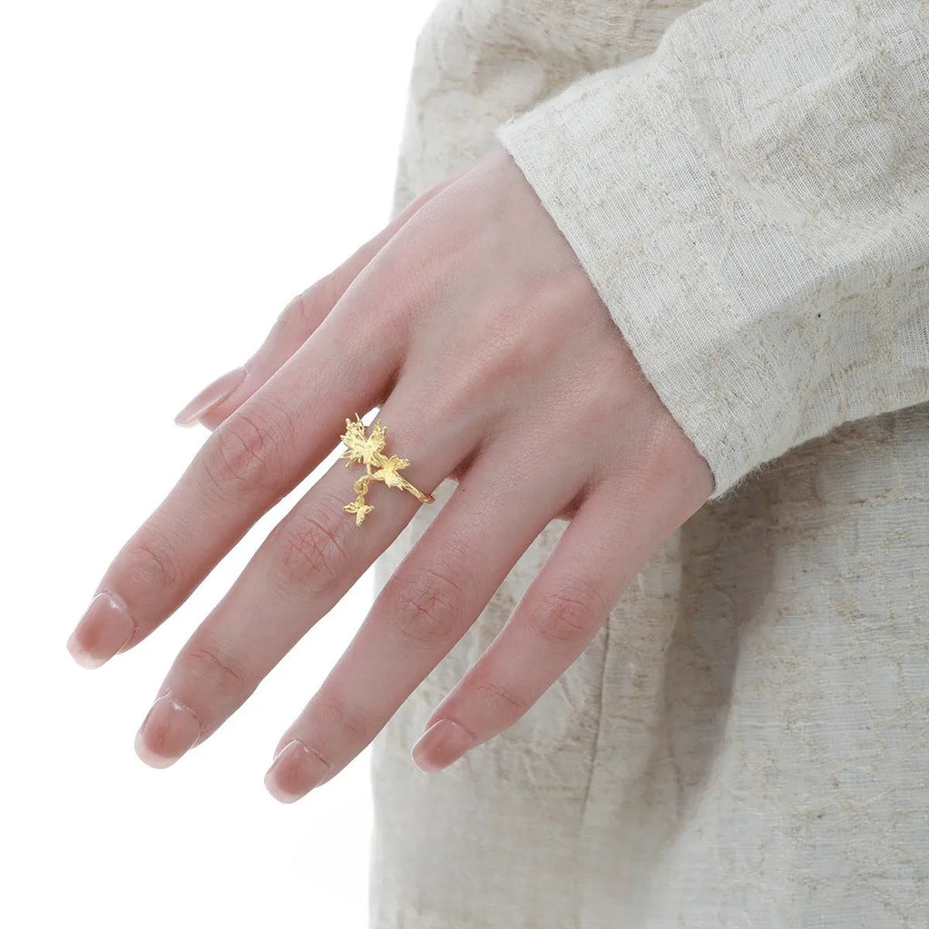 Adjustable silver ring with butterfly design in 18K gold or white gold electroplating on finger