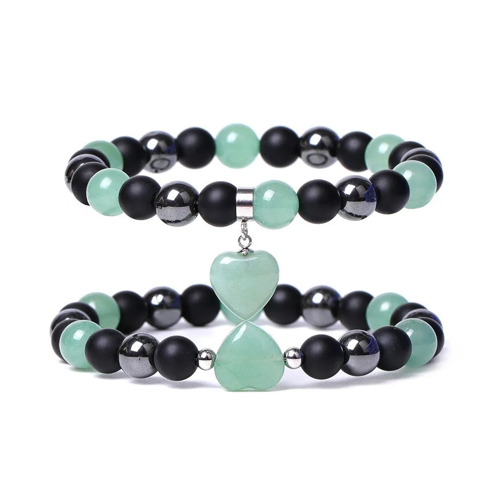 Hand-cut geometric peach heart bracelet in Tigereye stone with cosmic moon and planet elements