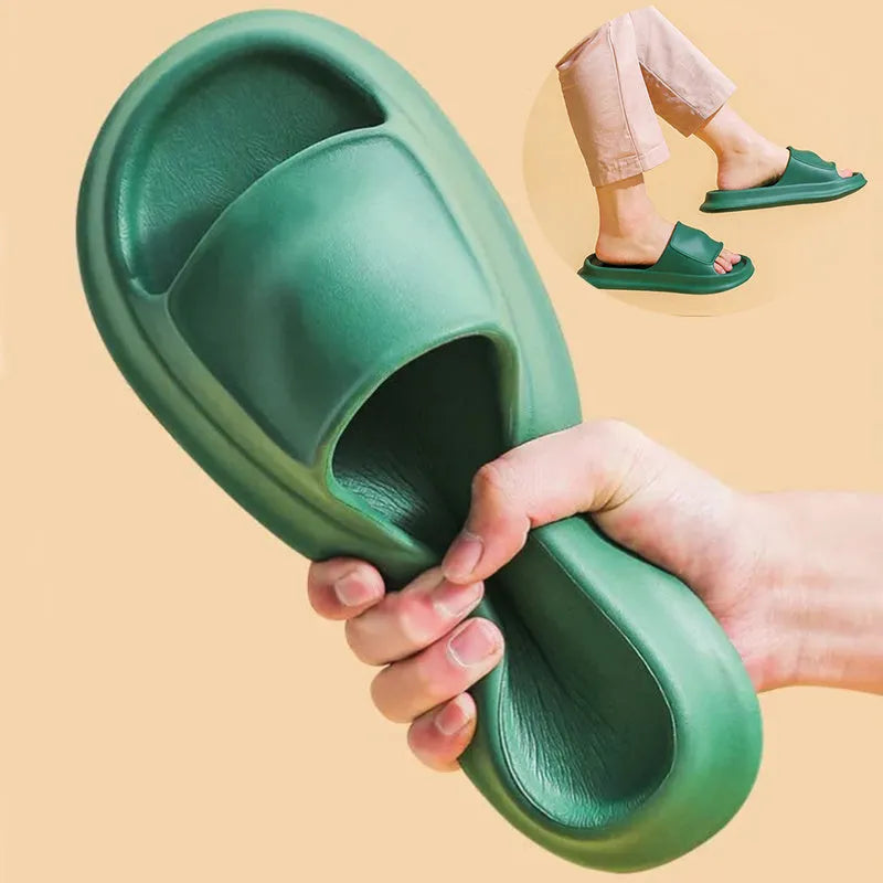 EVA flip-flop slippers with thick sole in multiple colours on a bathroom floor