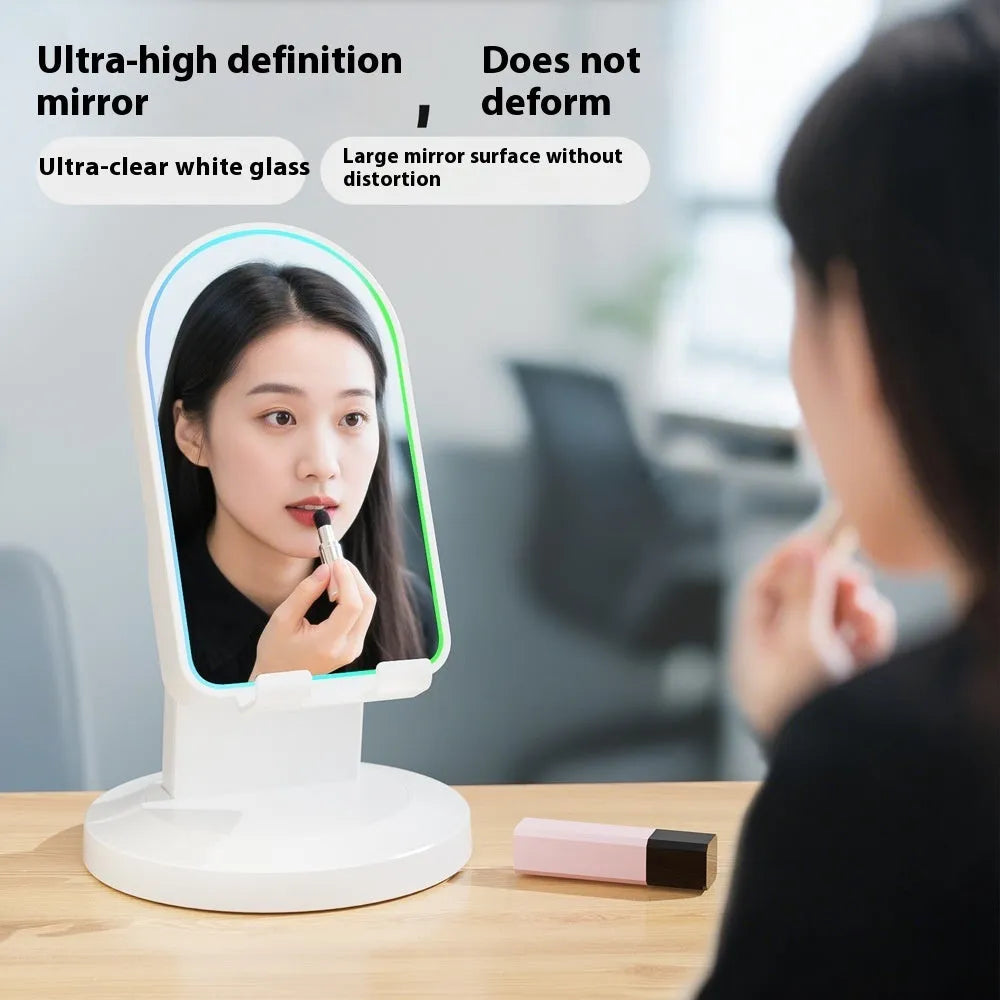 Three-in-one wireless induction speaker and Bluetooth phone bracket in black or white, common or mirror style, with built-in battery and USB cable.