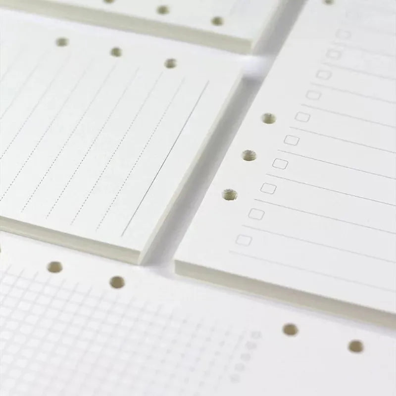 A5 6-hole loose-leaf refill with 40 sheets of Daolin paper in lined, blank, dot grid or square page styles.