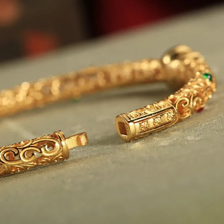 Women's gold-plated bracelet with xiangyun gourd charm and retro opening clasp on copper construction