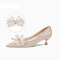 Sequined champagne crystal stiletto heels with pointed toe and rubber sole, available in multiple heel heights