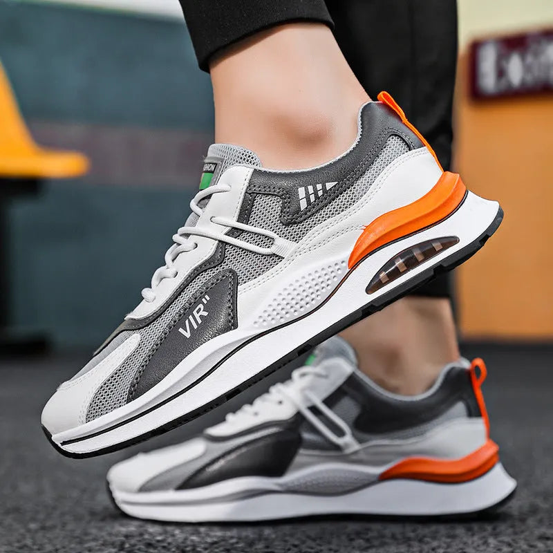 Men's gray breathable mesh running shoes with EVA sole and sewing thread details on upper