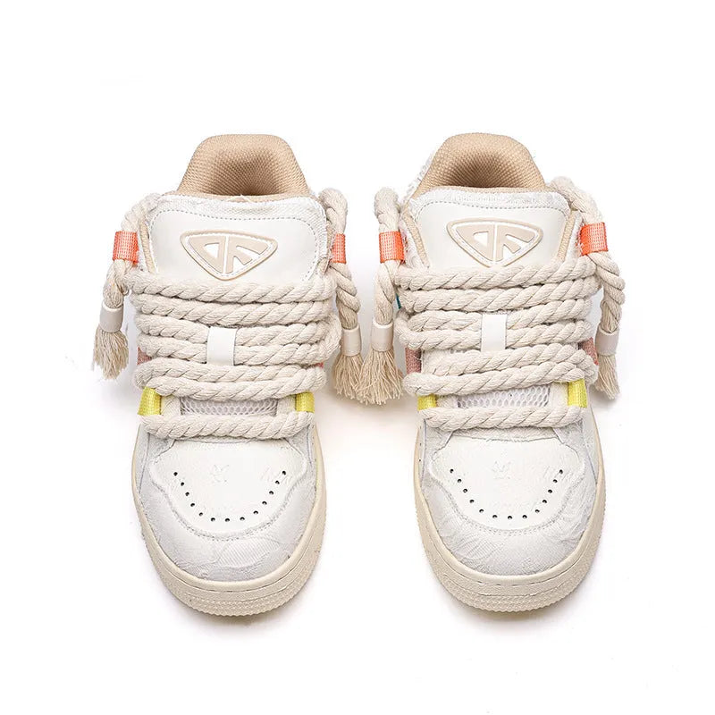 Creamy white retro skateboard shoes with low-top design, platform heel, and mesh lining details