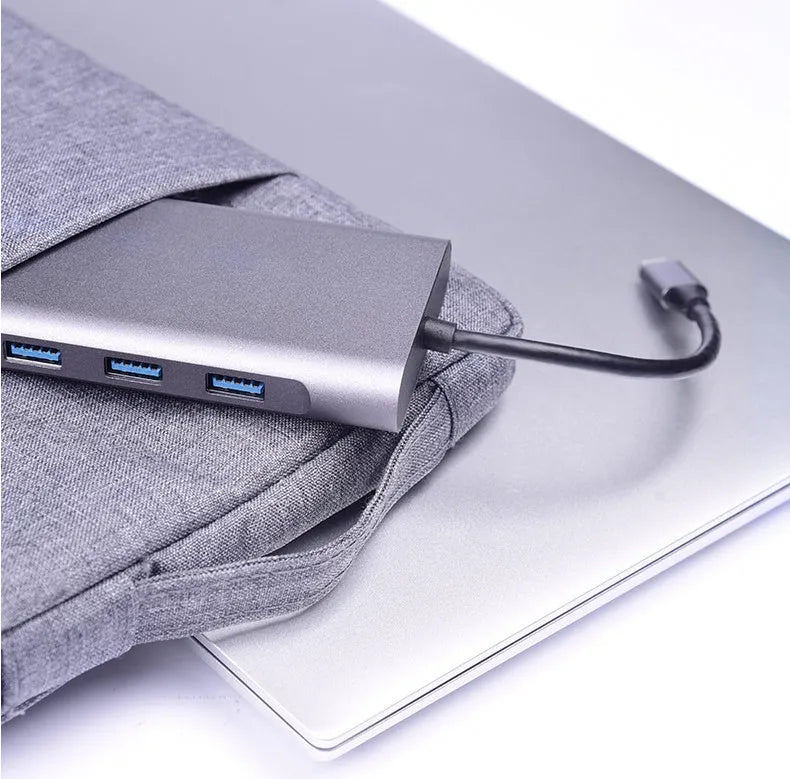 10-in-1 USB C docking station power bank compatible with Apple MacBook and iPhone devices