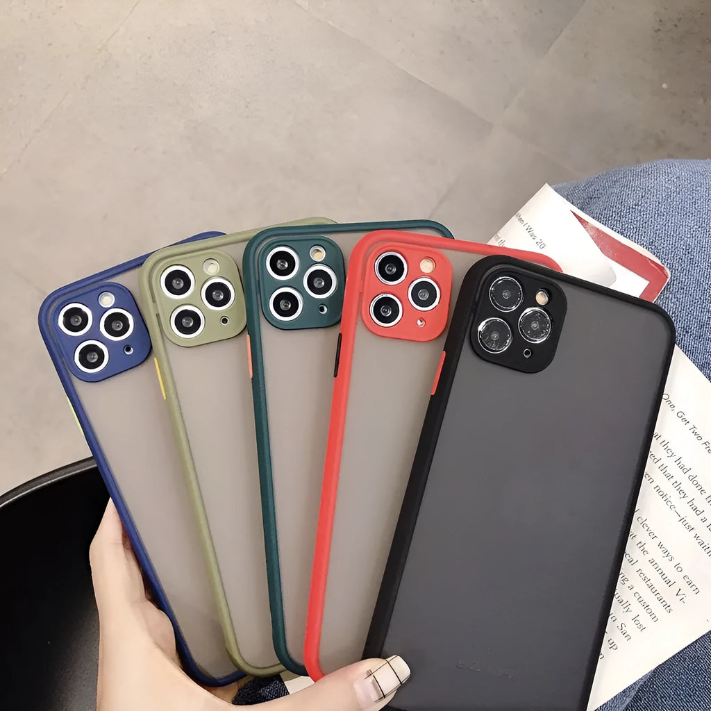 Solid colour silicone shockproof protective case for iPhone on a table.