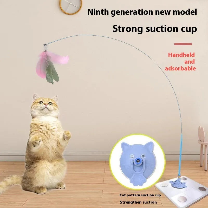 Cat teaser wand with suction cup base mounted on window featuring coloured cat face attachment
