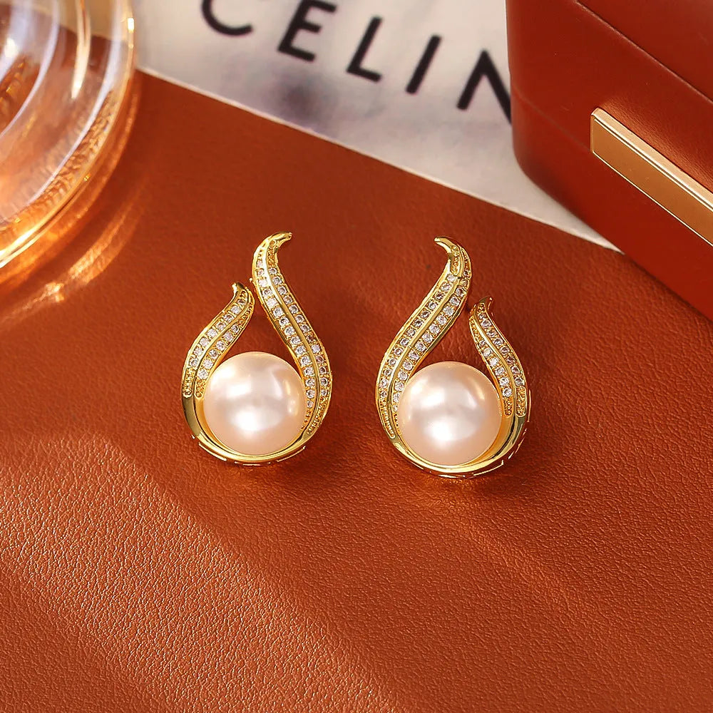 Glass pearl stud earrings with real gold plated copper, geometric round shape, shown in purple, champagne gold, gold, and silver.